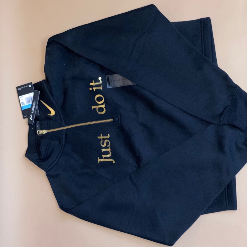 Nike gold check